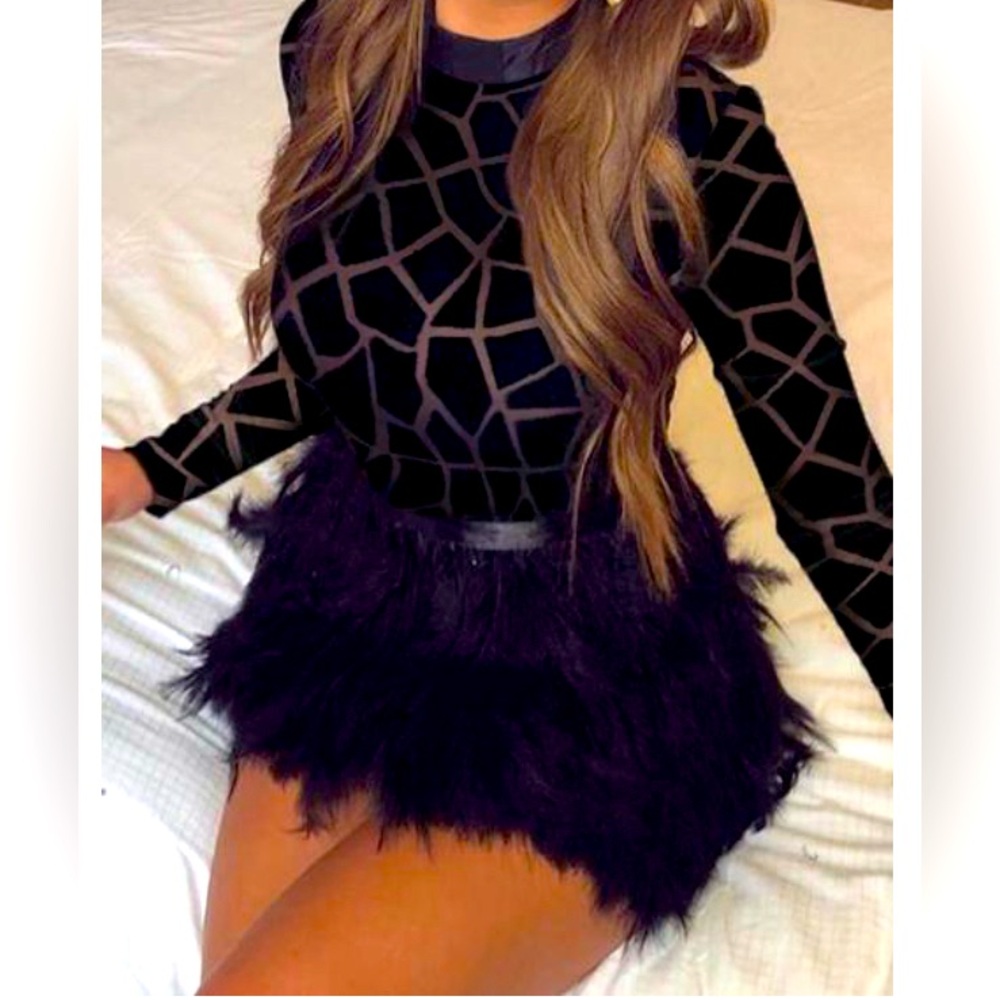 Women’s dress with feathers